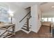 Modern staircase with wooden railings at 136 Wesser St # 53, Davidson, NC 28036