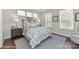 Cozy bedroom with bed and two windows at 136 Wesser St # 53, Davidson, NC 28036