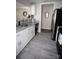 White shaker cabinets, granite counters, and gray tile backsplash at 195 Edward Ave # 13, Concord, NC 28025