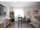 Small dining area with glass table and barstools at 195 Edward Ave # 13, Concord, NC 28025