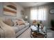 Living Room with gray couch and patterned pillows at 195 Edward Ave # 13, Concord, NC 28025