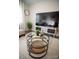 Living room with large TV and coffee table at 195 Edward Ave # 13, Concord, NC 28025