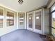Spacious screened porch with access to the interior at 7025 Stella Pl, Stanley, NC 28164