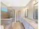 Bathroom with a double vanity and a large shower at 7025 Stella Pl, Stanley, NC 28164