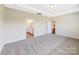 Bedroom with carpet flooring and access to bathroom at 7025 Stella Pl, Stanley, NC 28164