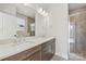 Double vanity bathroom with a large shower and modern fixtures at 1432 Hamilton St # 14, Charlotte, NC 28206