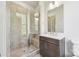 Bathroom with shower, tile surround, and modern vanity at 1432 Hamilton St # 14, Charlotte, NC 28206