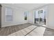 Well-lit bedroom with sliding glass doors leading to a private balcony at 1432 Hamilton St # 14, Charlotte, NC 28206