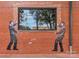 Modern brick building with large window and unique street art at 1432 Hamilton St # 14, Charlotte, NC 28206