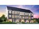 Three story townhome with gray and blue siding at 1432 Hamilton St # 14, Charlotte, NC 28206