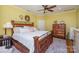 Spacious bedroom with a wooden bed frame and dresser at 10227 Mount Holly Rd, Charlotte, NC 28214