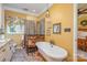 Spa-like bathroom with soaking tub and walk-in shower at 10227 Mount Holly Rd, Charlotte, NC 28214