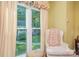 Cozy sitting area with a comfy chair and large window at 10227 Mount Holly Rd, Charlotte, NC 28214