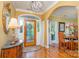 Elegant entryway with hardwood floors, a stained glass door and decorative accents at 10227 Mount Holly Rd, Charlotte, NC 28214