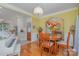 Elegant dining room with hardwood floors and arched entryway at 10227 Mount Holly Rd, Charlotte, NC 28214