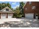 Two-car attached garage and a detached garage with extra storage space at 721 Orphanage Rd, Concord, NC 28027