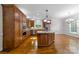 Spacious kitchen featuring granite island, stainless steel appliances, and ample wood cabinetry at 721 Orphanage Rd, Concord, NC 28027