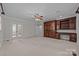 Large main bedroom with built-in cabinetry and en-suite bathroom at 721 Orphanage Rd, Concord, NC 28027