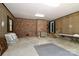 Spacious garage with brick walls and ample storage space at 715 Saint Cloud Dr, Statesville, NC 28625