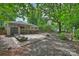 Large backyard with patio, shed and fire pit at 5328 Seacroft Rd, Charlotte, NC 28210