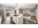 Modern kitchen with island and stainless steel appliances at 5328 Seacroft Rd, Charlotte, NC 28210