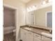 Bathroom with double vanity, granite countertops at 6997 Cobblefield Ln, Denver, NC 28037