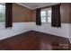 Dining room with hardwood floors and wainscoting at 619 Holiday Rd, Gastonia, NC 28054