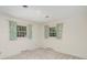 Bedroom with two windows and neutral decor at 324 Club House Dr, Salisbury, NC 28144