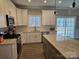 Kitchen with white shaker cabinets, subway tile backsplash, and stainless steel appliances at 1886 Hollybrook Ln, Lancaster, SC 29720