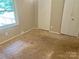 Carpeted bedroom with window and closet at 2753 Harmony Hwy, Harmony, NC 28634