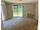 Bedroom with sliding glass doors and access to deck at 2753 Harmony Hwy, Harmony, NC 28634