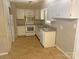 Bright kitchen features white cabinets, and neutral countertops at 2753 Harmony Hwy, Harmony, NC 28634