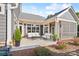 Relaxing patio furniture on a spacious patio with screened porch at 1346 Millview Ln, Matthews, NC 28104