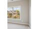 Bright bedroom with large window and neighborhood view at 1346 Millview Ln, Matthews, NC 28104