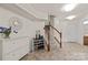 Bright entryway with tile flooring, staircase, and storage at 9341 Lenox Pointe Dr, Charlotte, NC 28273