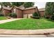 Two-car garage and landscaped lawn at 321 10Th Ne Ave, Conover, NC 28613