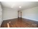 Living room with hardwood floors and access to other rooms at 511 Villa St, Kannapolis, NC 28083