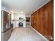 Modern kitchen with stainless steel appliances and white cabinets at 511 Villa St, Kannapolis, NC 28083