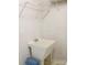 Laundry room with utility sink and shelving for storage at 452 Mocksville Hwy, Statesville, NC 28625