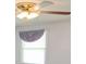 Bedroom with window, ceiling fan and valance at 452 Mocksville Hwy, Statesville, NC 28625