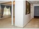Hallway with neutral walls, carpeting, and decorative column at 452 Mocksville Hwy, Statesville, NC 28625