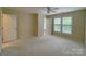 Spacious bedroom with ceiling fan and window shutters at 135 S Arcadian Way, Mooresville, NC 28117