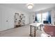 Home office with built-in shelving and a modern workspace at 19577 Meta Rd, Cornelius, NC 28031