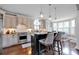 Well-equipped kitchen featuring granite countertops and an island with seating at 19577 Meta Rd, Cornelius, NC 28031
