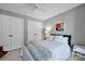 Well-lit bedroom with a double door closet and natural light at 19577 Meta Rd, Cornelius, NC 28031