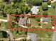 Aerial view of a house with a large backyard and detached structure at 19577 Meta Rd, Cornelius, NC 28031