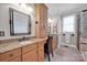 Elegant bathroom with granite countertops, double sinks, and a large shower at 19577 Meta Rd, Cornelius, NC 28031