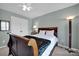 Bright bedroom with double door closet and neutral wall color at 19577 Meta Rd, Cornelius, NC 28031