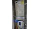 Utility closet with water heater and HVAC system at 1600 H Arlyn Cir, Charlotte, NC 28213