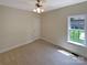 Bright bedroom with carpet and a window at 5901 Morgan Park Dr, Monroe, NC 28110